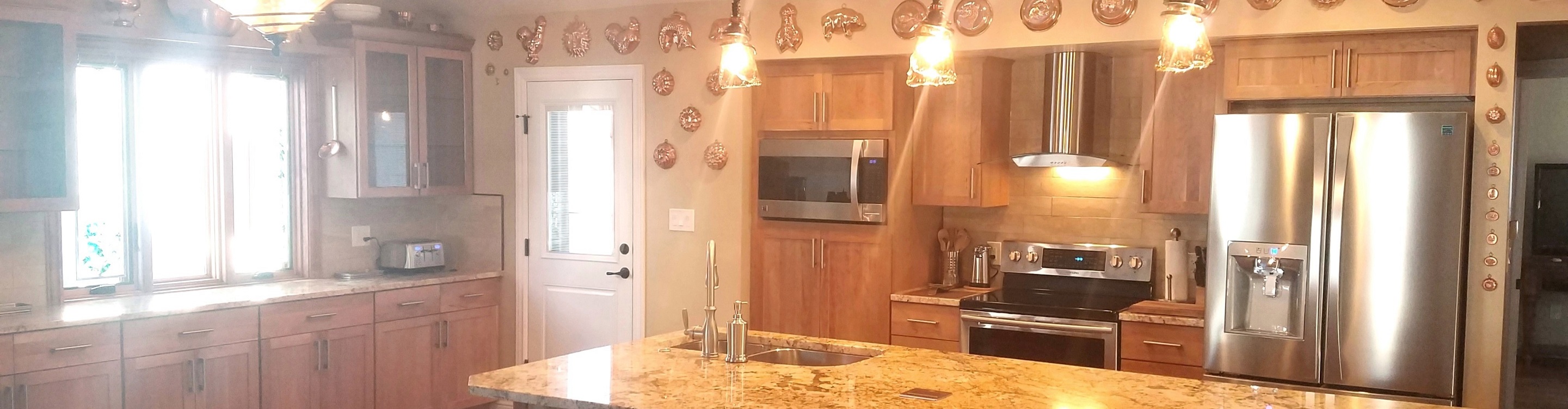 modern farmhouse kitchen with white cabinets and white countertops
